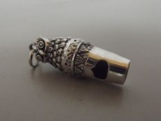 Silver stamped whistle, owl