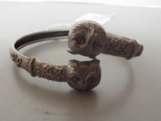 800 grade silver bangle, the ends depicting owl's