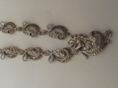 Ornate necklace stamped silver