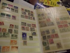 Stamp album containing British and World stamps