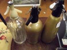 Three vintage soda siphons