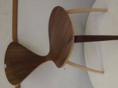 Brown wood chair with heart back