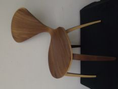Brown wood chair with heart back