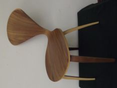 Brown wood chair with heart back