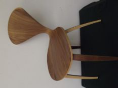Brown wood chair with heart back