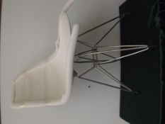 Eames inspired chair in white fibre glass seat wit