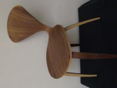 Brown wood chair with heart back