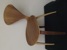 Brown wood chair with heart back