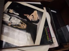 Record player together with LP records.