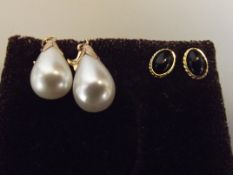 2 pairs of 9 ct gold mounted earrings