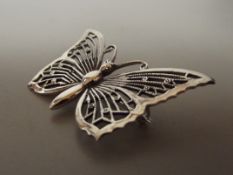 Silver stamped brooch, butterfly
