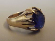 9 ct gold gent's ring with large blue gemstone
