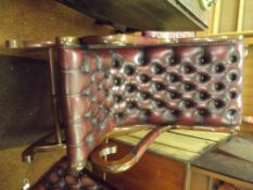 Ox blood deep buttoned leather rocking chair
