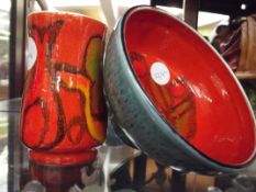 Poole vase together with a Poole dish