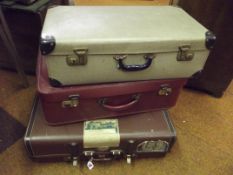 Three vintage suitcases