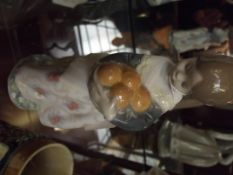 Lladro figure of girl with fruit