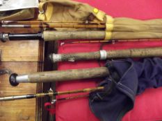 Three split cane fishing rods