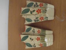 Two Arthur Wood wall pockets