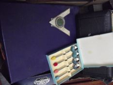 Mixed box of flatware to include a car badge