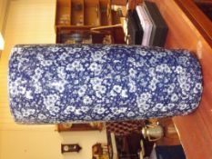 Blue and white stick stand