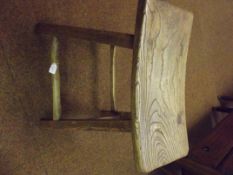 19th century elm stool of pegged construction