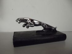 Jaguar car mascot on a plinth