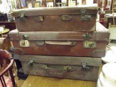 Three vintage suitcases