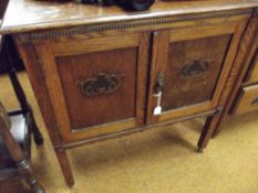 Early 20th century oak pot cupboard on castors