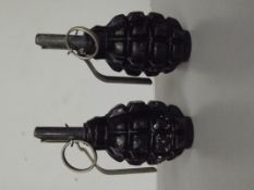 Pair of inert grenades