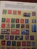 Two stamp albums together with loose stamps