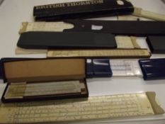 Group of seven vintage slide rules