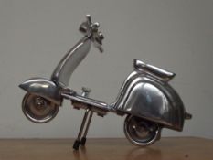 Chrome Vespa scooter
