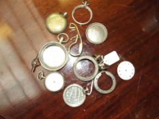 Various pocket watches cases and faces for spares