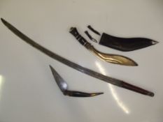 Eastern sword, a Kukri and skinning knives, togeth