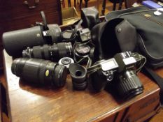 Cannon SLR camera, soft case with additional lense