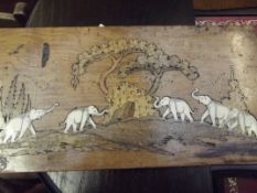 Interesting inlaid and carved plaque depicting ele