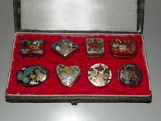 8 boxed miniature enamelled trinket boxes