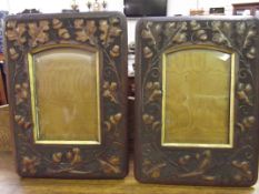 Pair of leather bound photograph frames with oak l