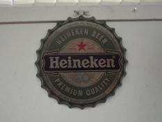 Heineken bottle top sign