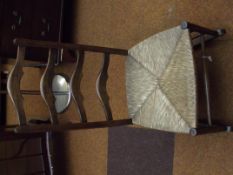 Rush seated ladder back rocking chair