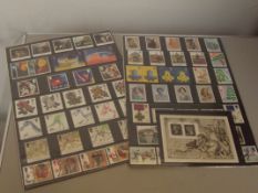 Two packs of mint stamps