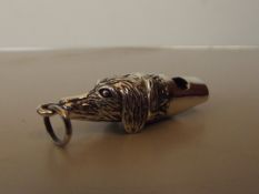 Silver whistle in the form of a hound