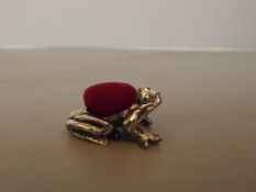 Silver pin cushion in the form of a frog