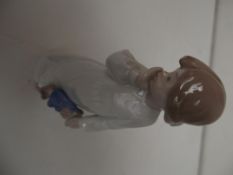 Nao figure of a girl with a doll