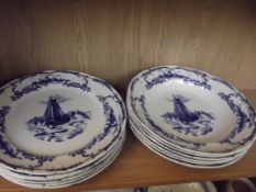 Six Delft plates together with six Delft bowls