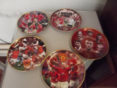 Five football plates