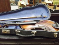 Cased violin