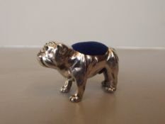 Silver pin cushion in the form of a bulldog