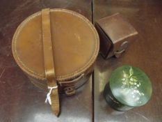 Two leather boxes and one other