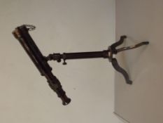 Telescope on tripod stand,